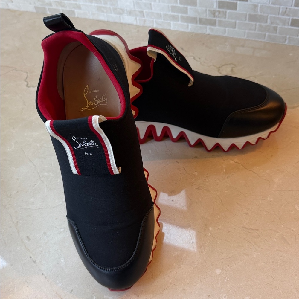 Christian Louboutin
Tiketa Slip-On Runner Sneakers